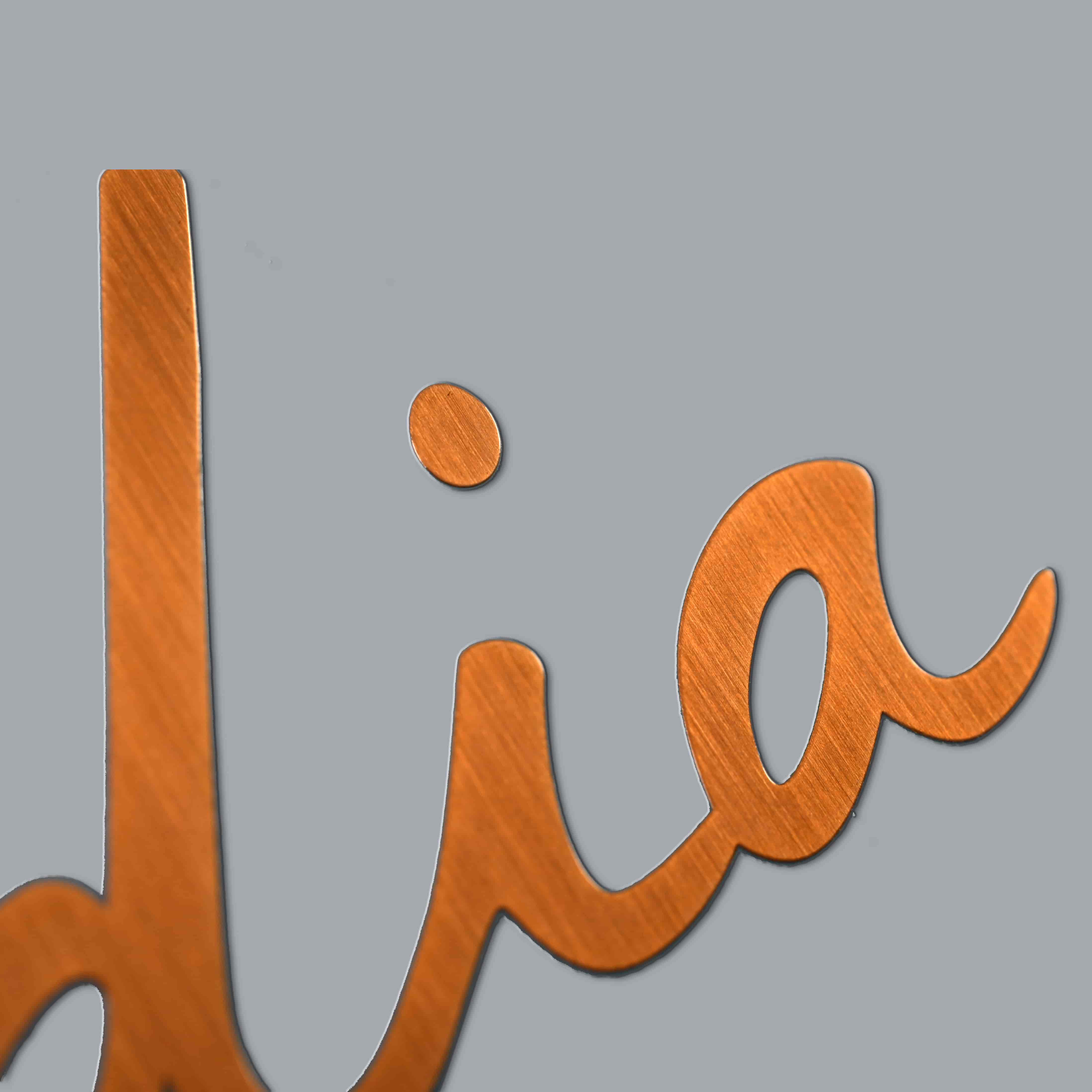 Logo mạ điện Niken dập nổi